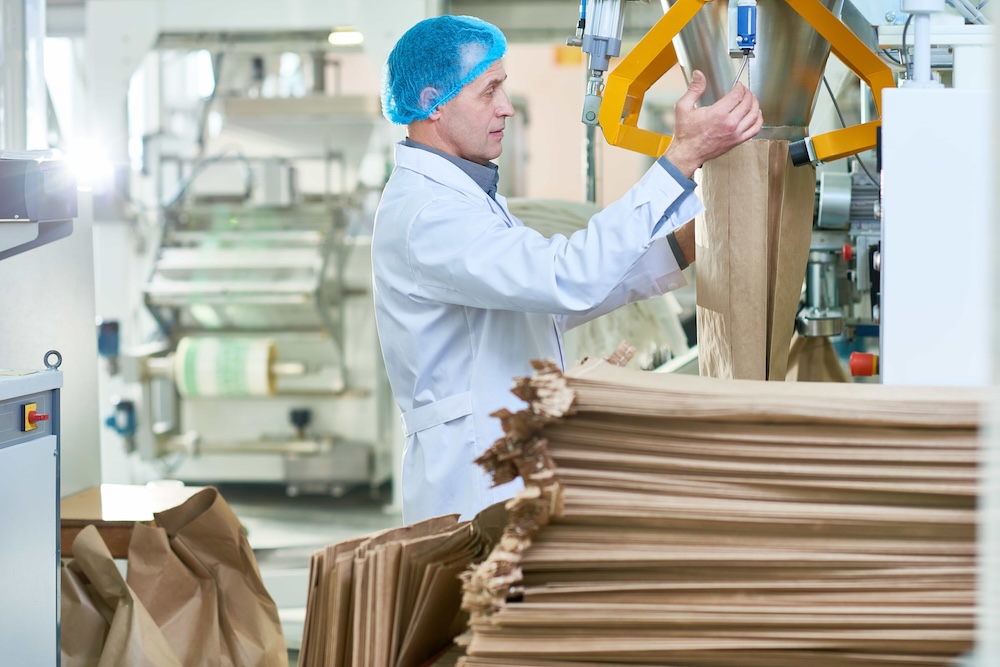 Illustration du métier : Conducteur d'équipement de fabrication de papier ou de carton (h/f/x)