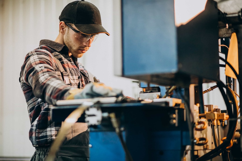 Illustratie van het beroep : Machinebouwer