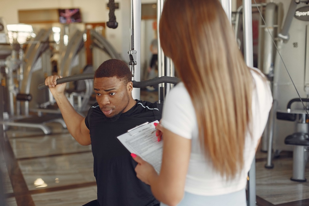 Illustratie van het beroep : Fitnessbegeleider